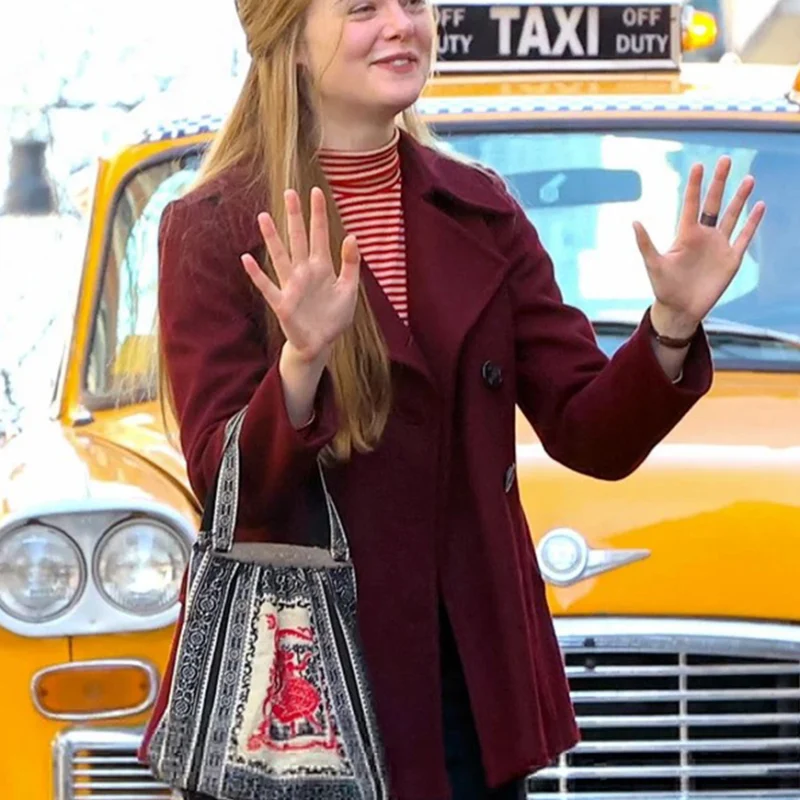 a-complete-unknown-elle-fanning-sylvie-maroon-coat a-complete-unknown-elle-fanning-sylvie-maroon-coat